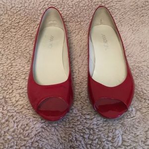 Markon red patent leather shoes.